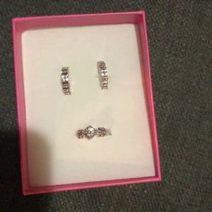 Size 6 ring with matching earring.